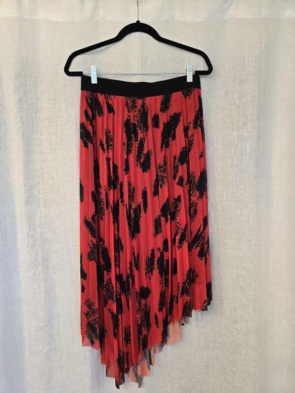 Red Pleated Asymmetric Skirt with Black Abstract Print
